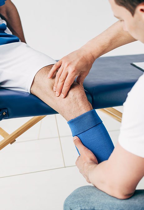 Sports massage being applied to a client's leg